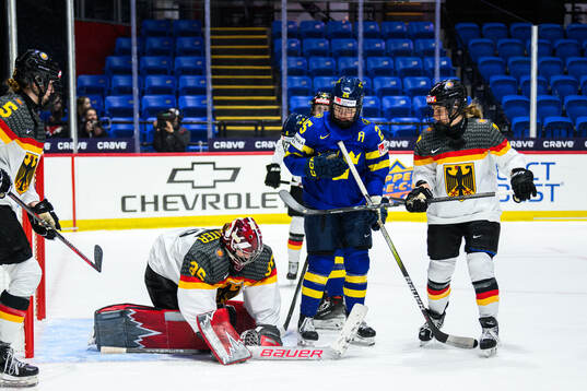 Goaltender Sandra Abstreiter of Germany, Lina Ljungblom of