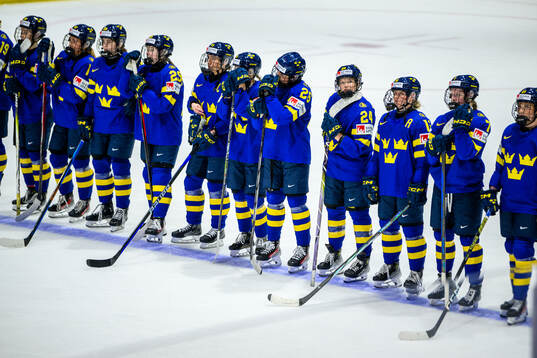 Players of Sweden look dejected
