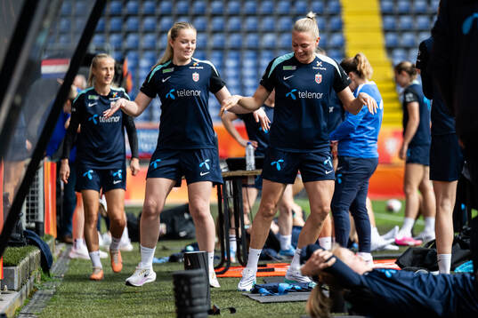 Goalkeeper Guro Pettersen and Guro Bergsvand of the