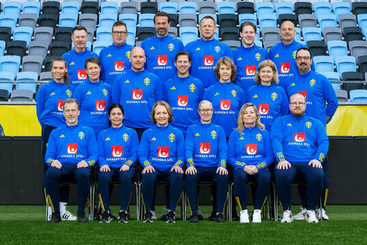Staff of the Swedish women’s national football team pose