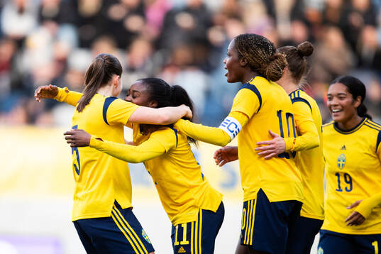 Monica Jusu Bah of Sweden celebrates