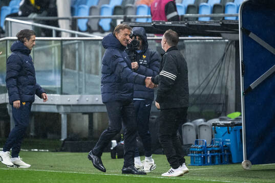 Head coach Hervé Renard of France and head coach Peter