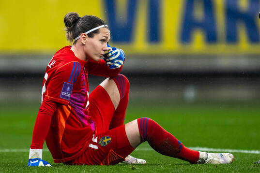 Goalkeeper Jennifer Falk of Sweden in pain