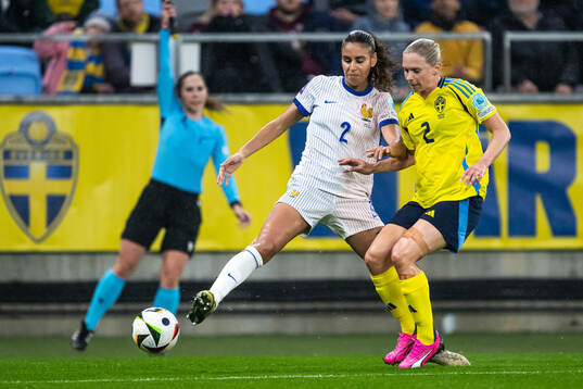 Maelle Lakrar of France and Jonna Andersson of Sweden