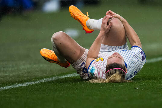 Eugénie Le Sommer of France in pain