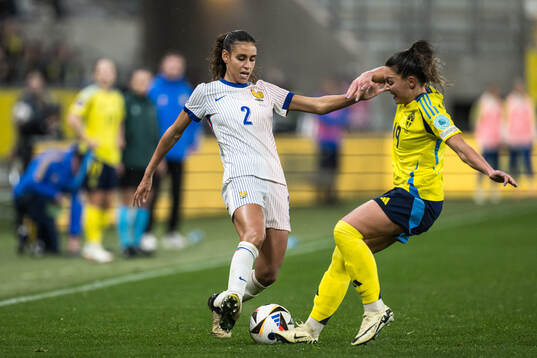 Maelle Lakrar of France and Johanna Rytting Kaneryd of