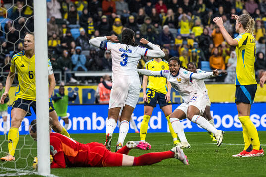Wendie Renard and Marie-Antoinette Katoto of France