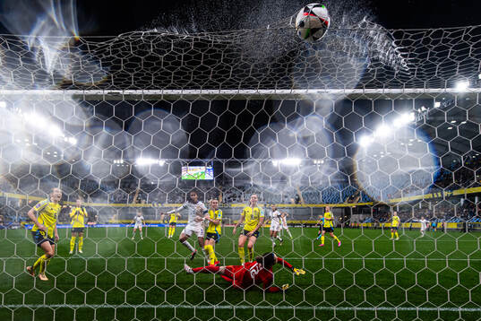 Wendie Renard of France scores the 0-1 goal behind