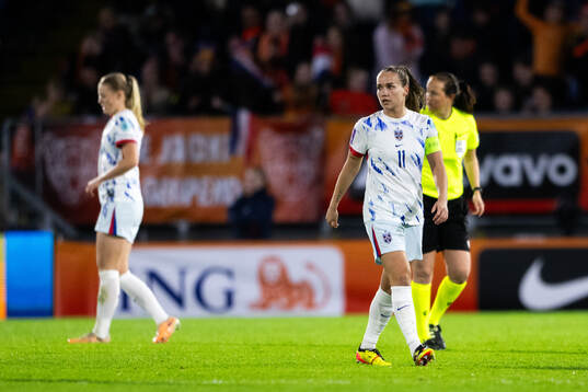 Guro Reiten of Norway looks dejected