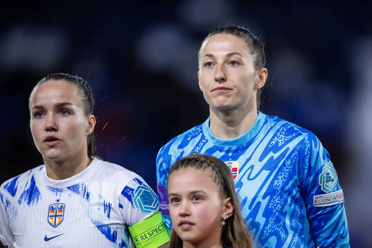 Guro Reiten and goalkeeper Cecilie Fiskerstrand  of Norway