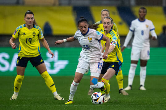 Selma Bacha of France and Kosovare Asllani of Sweden