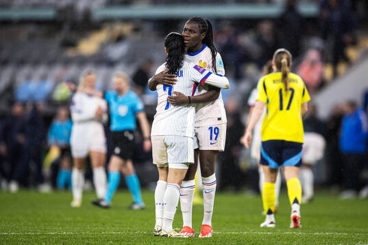 Sakina Karchaoui and Griedge Mbock Bathy of France celebrate
