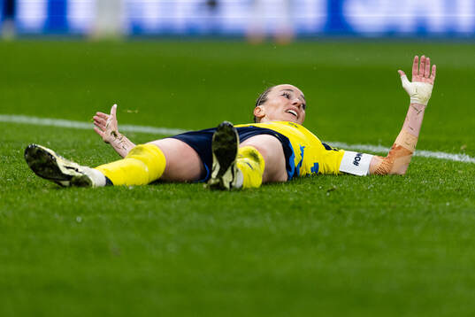 Kosovare Asllani of Sweden looks dejected