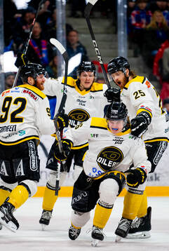 Patrick Rørbu Elvsveen of Stavanger Oilers celebrates