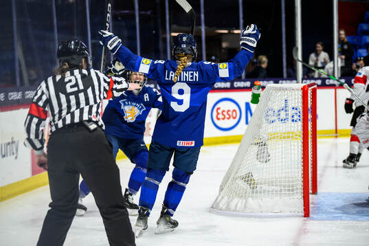 Nelli Laitinen of Finland celebrates