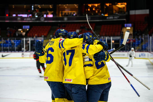 Hilda Svensson of Sweden (not in picture) celebrates with