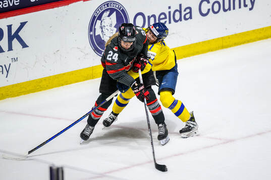 Natalie Spooner of Canada and Mira Jungåker of Sweden