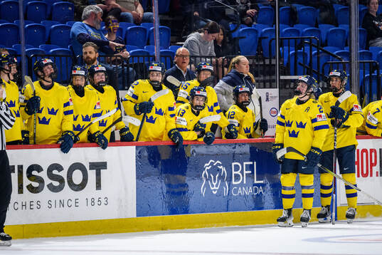 Players of Sweden look dejected