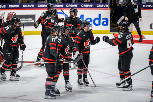 Players of Canada celebrate