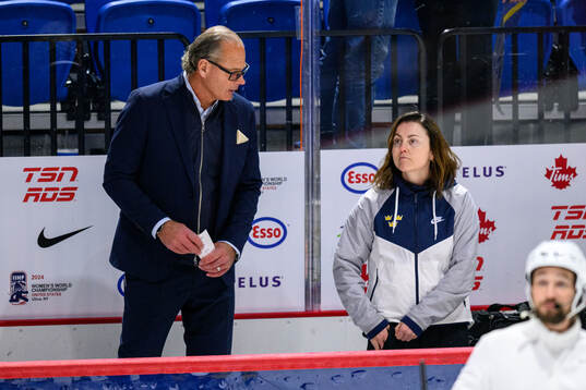 Assistant coach Andreas Spångberg and Physiotherapist Elin