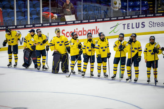 Players of Sweden look dejected