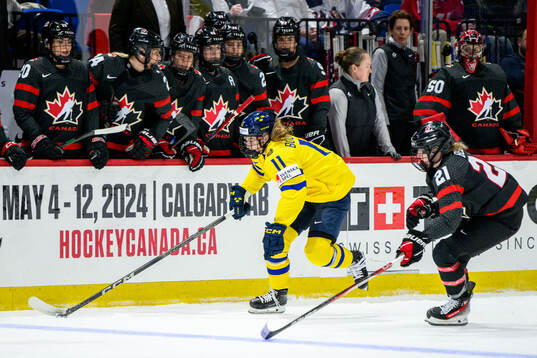 Josefin Bouveng of Sweden and Ashton Bell of Canada