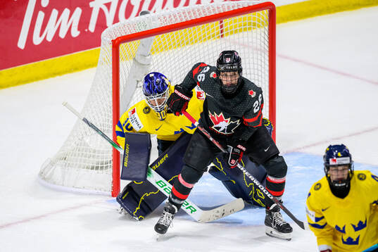 Goaltender Emma Söderberg of Sweden and Emily Clark of