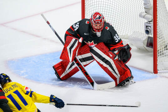 Goaltender Emerance Maschmeyer of Canada