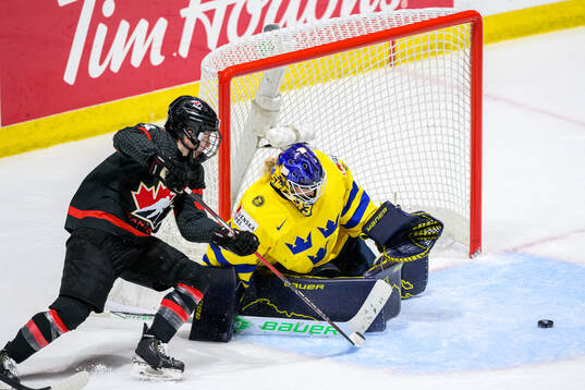Jocelyne Larocque of Canada and goaltender Emma Söderberg