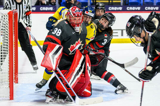Goaltender Emerance Maschmeyer of Canada, Thea Johansson of