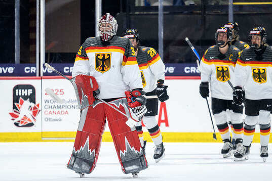 Goaltender Sandra Abstreiter of Germany looks dejected