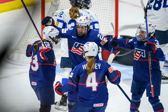 Hannah Bilka of USA celebrates with teammates
