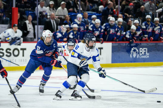 Hilary Knight of USA and Petra Nieminen of Finland