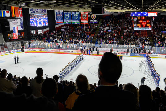 Players of Finland and of USA