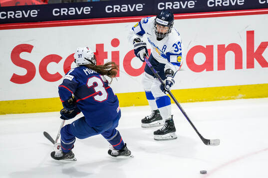 Taylor Heise of USA and Michelle Karvinen of Finland