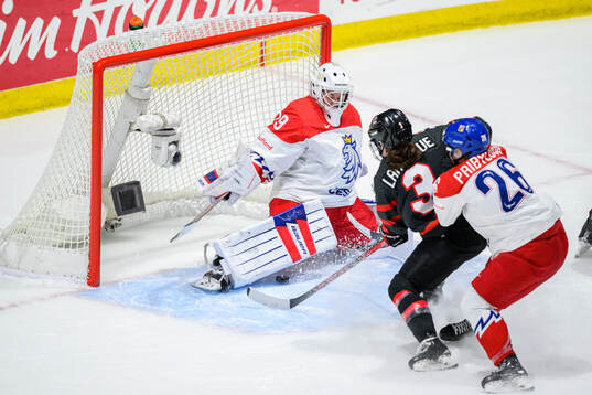 Jocelyne Larocque of Canada scores the 2-0 goal behind
