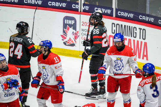 Emily Clark of Canada celebrates scoring 3-0