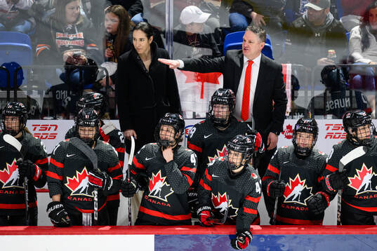 Assistant coach Caroline Ouellette and Head coach Troy Ryan
