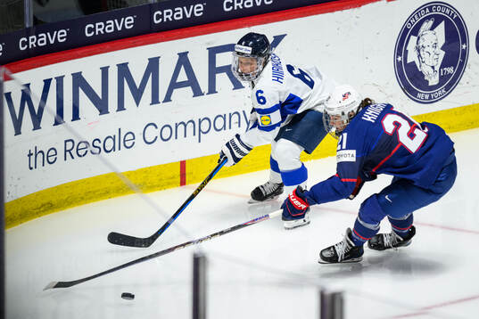 Jenni Hiirikoski of Finland and Hilary Knight of USA