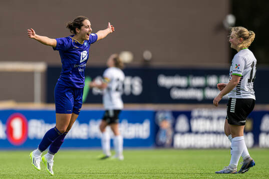 Julie Belden Rasmussen of Fyllingsdalen celebrates