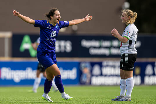 Julie Belden Rasmussen of Fyllingsdalen celebrates