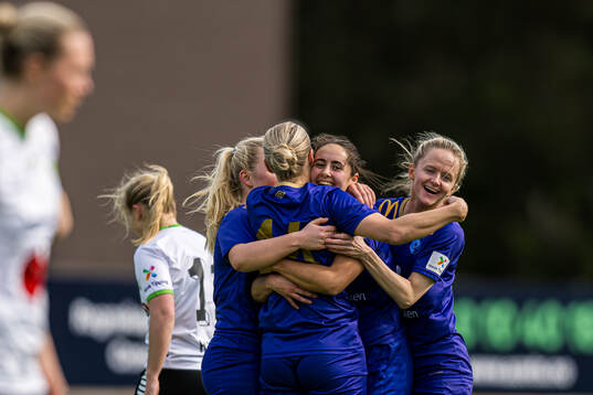 Julie Belden Rasmussen of Fyllingsdalen celebrates