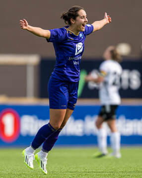 Julie Belden Rasmussen of Fyllingsdalen celebrates