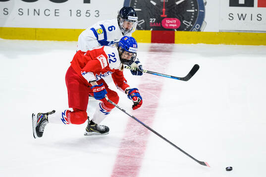 Tereza Plosova of Czech Republic and Jenni Hiirikoski of