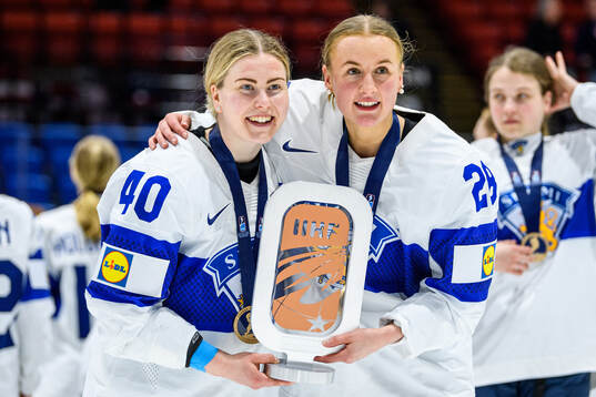 Noora Tulus and Jenniina Nylund of Finland cleebrate
