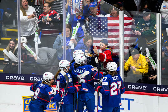 Laila Edwards of USA celebrates with teammates
