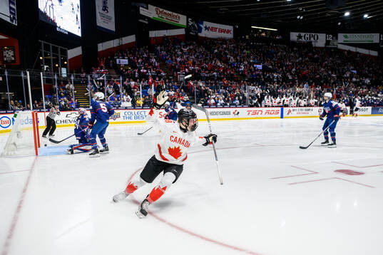 Julia Gosling of Canada celebrates scoring 1-2