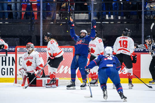 Alex Carpenter of USA celebrates scoring 3-2