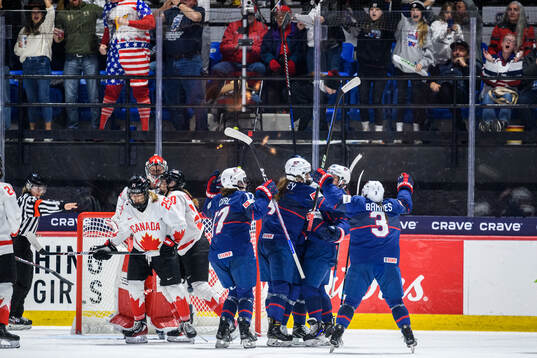Alex Carpenter of USA (not in picture) celebrates with