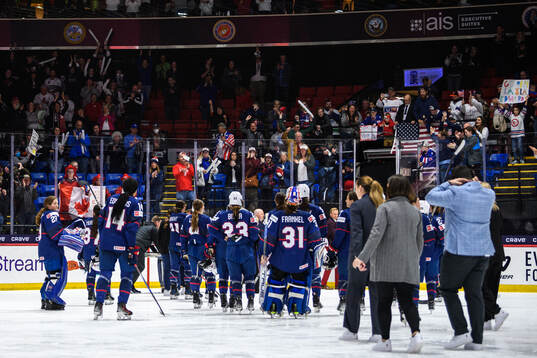 Players of USA leave the ice